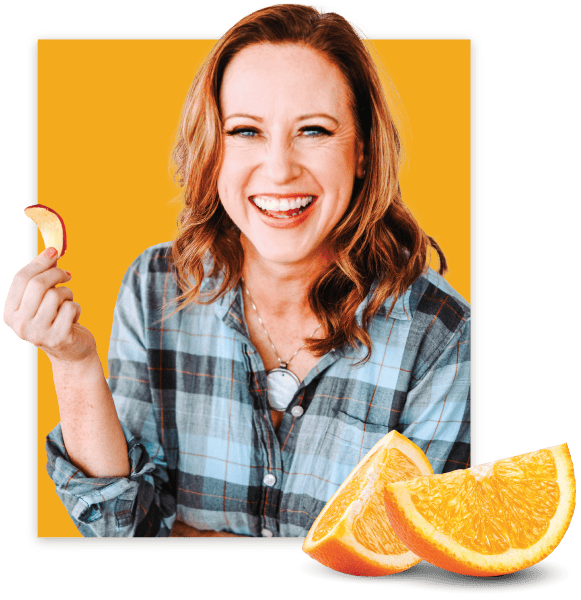 Tara Coleman holding an apple